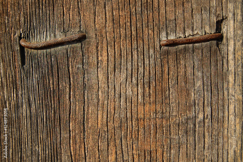 wooden background with nail, wood texture