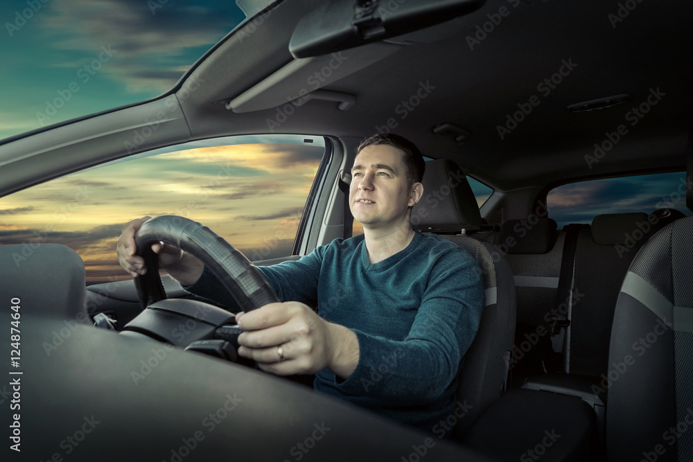 Man sitting and driving in the car. Man sitting and driving in the car.