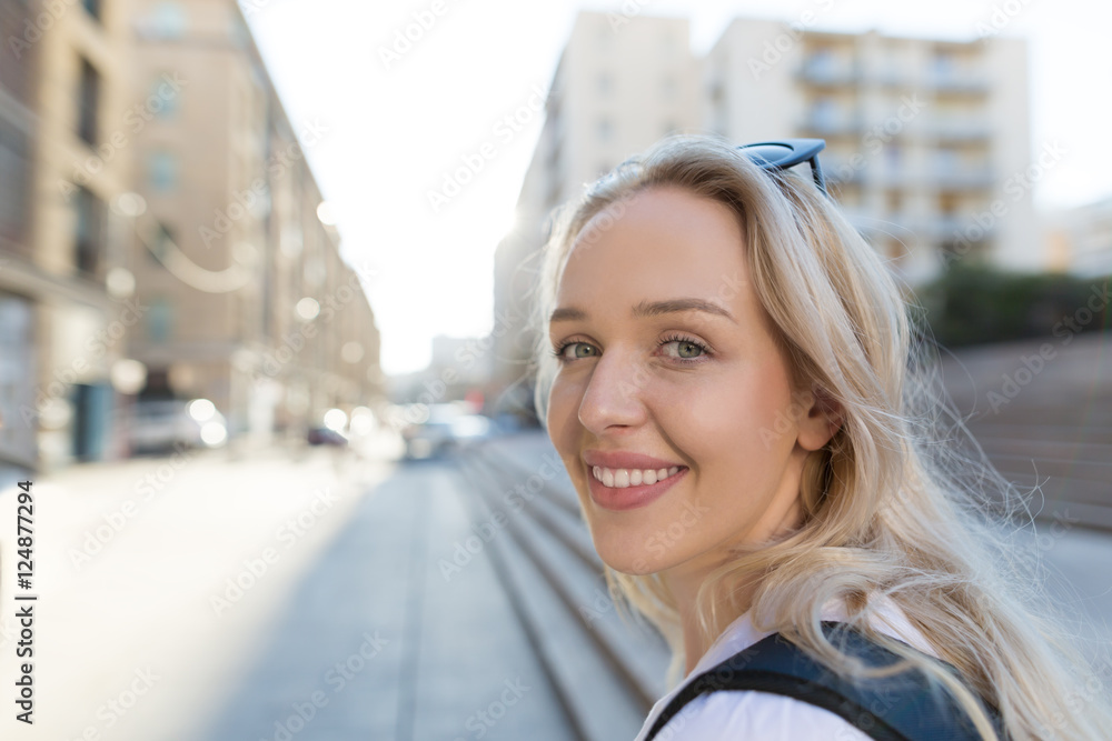 Portrait of a Stylish Pretty Young Woman traveling throug city Portrait of a Stylish Pretty Young Woman traveling throug city