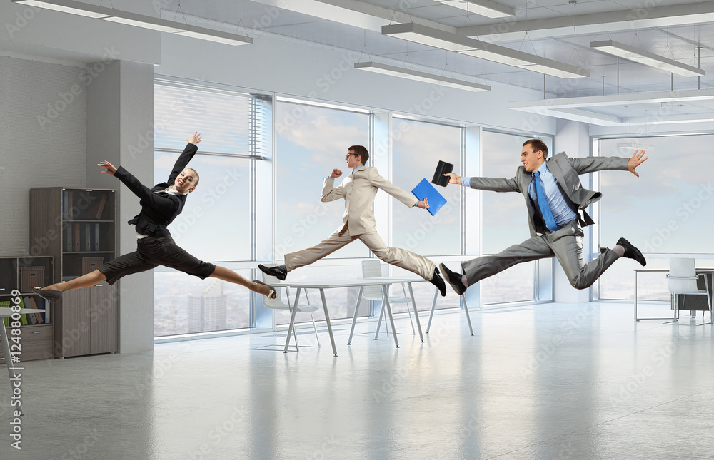© Sergey Nivens - Dancing businesspeople in office room . Mixed media © Sergey Nivens - Dancing businesspeople in office room . Mixed media