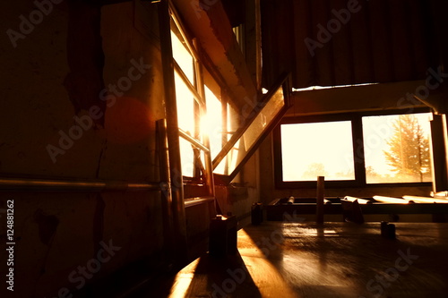 Old dark Grunge Warehouse with sunflare