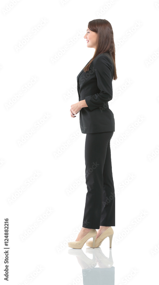 Business woman stand profile with white wall background Business woman stand profile with white wall background