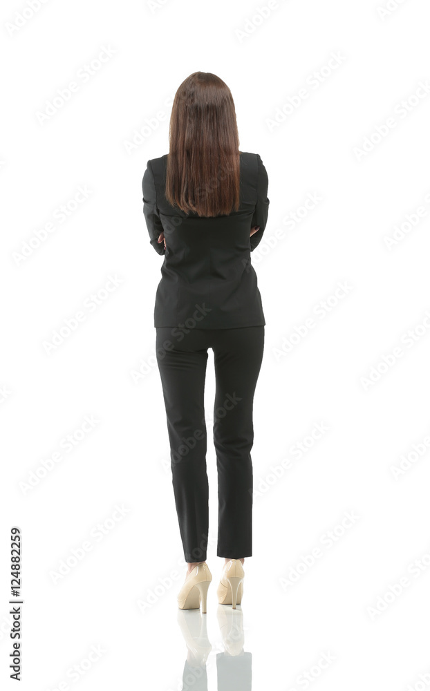 Business woman from the back - looking at something over a white Business woman from the back - looking at something over a white