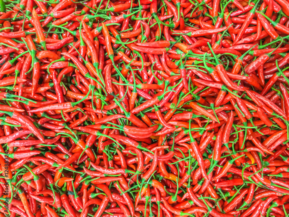 Closeup surface pile of red pepper or red paprika textured background Closeup surface pile of red pepper or red paprika textured background