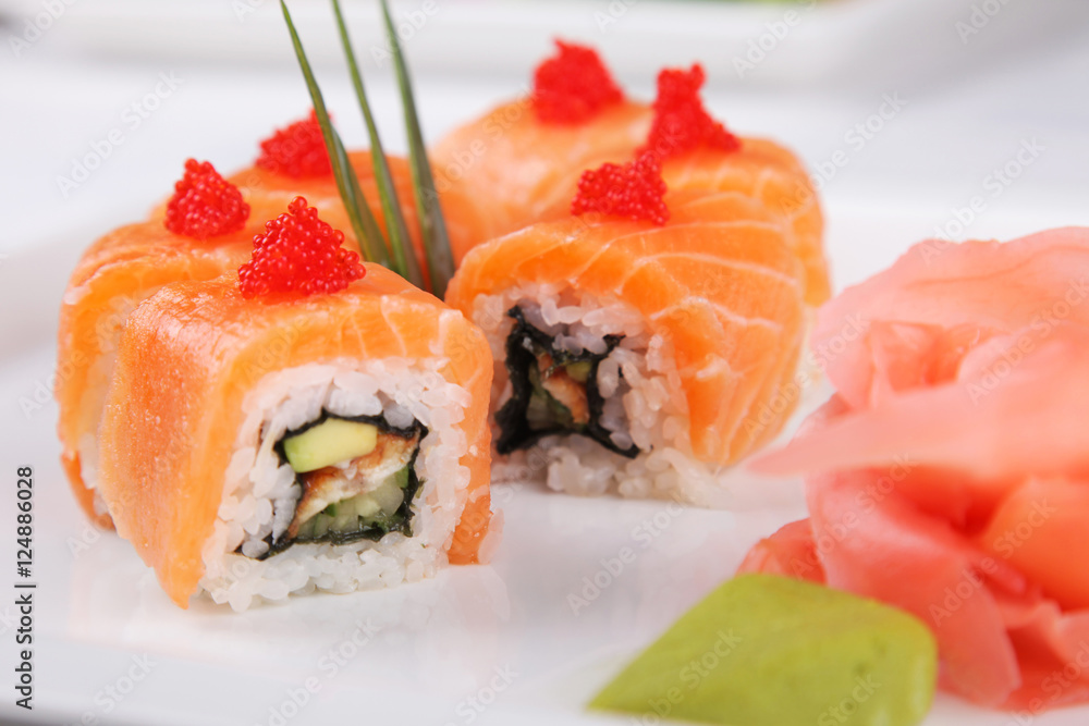 Sushi Set sashimi and sushi rolls served on stone slate Sushi Set sashimi and sushi rolls served on stone slate