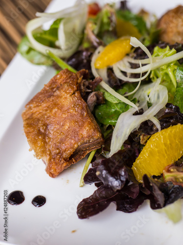 Crispy duck with salad photo