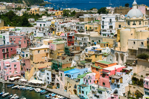 The charming port of Corricella with its colorful fishermen houses, island of Procida, Naples, Italy