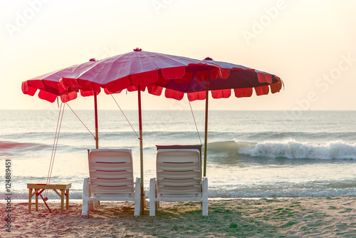 summer vacation  tourism  travel  holidays and people concept  folding chair on beach