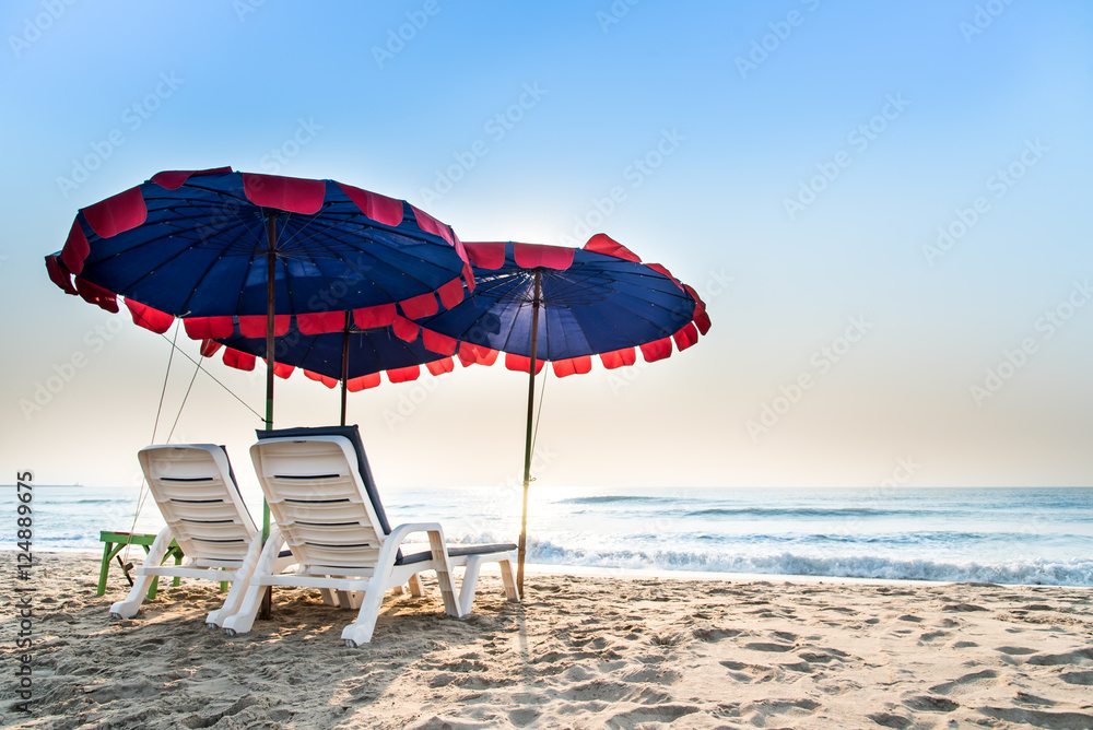 summer vacation, tourism, travel, holidays and people concept, folding chair on beach