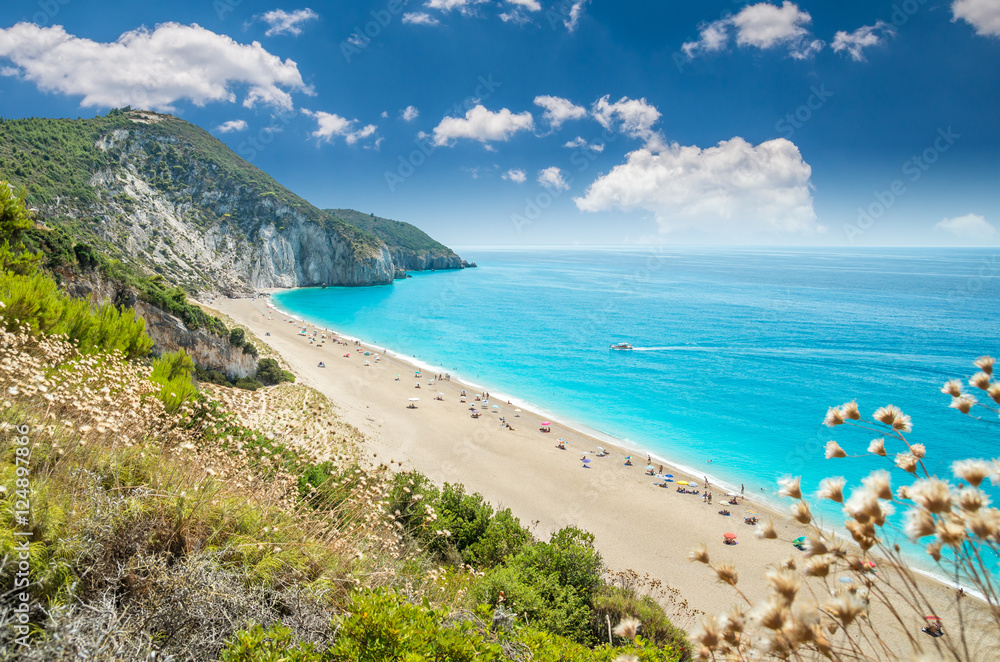 Milos beach on Lefkada island, Greece. Milos beach near the Agios Nikitas village on Lefkada, Greece Milos beach on Lefkada island, Greece. Milos beach near the Agios Nikitas village on Lefkada, Greece