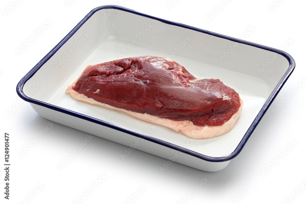 raw duck breast on butcher tray raw duck breast on butcher tray