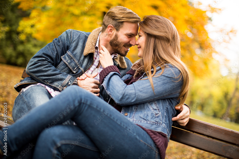 Young couple in the autumn park Young couple in the autumn park