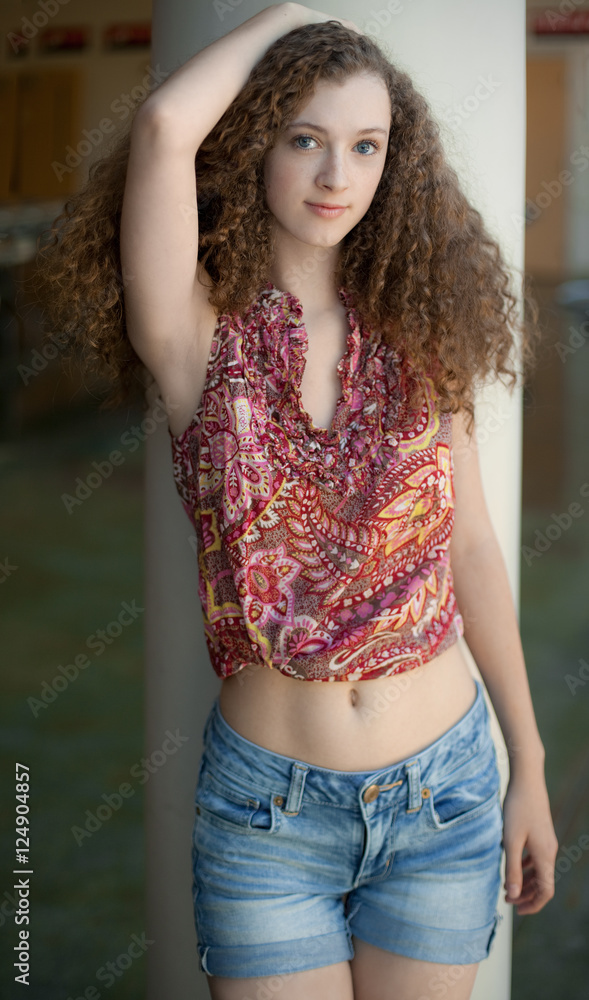 Teen in Crop Top and Jean Shorts Stock Photo | Adobe Stock