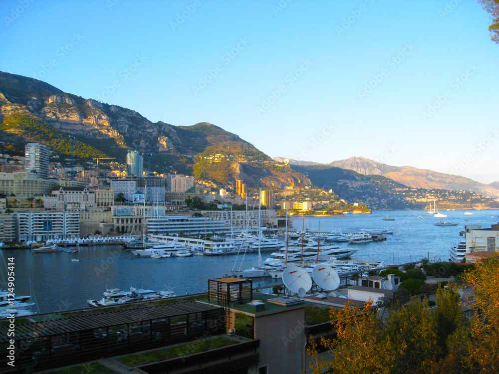 Monte Carlo city panorama. View of luxury yachts and apartments in harbor of Monaco, Cote d'Azur