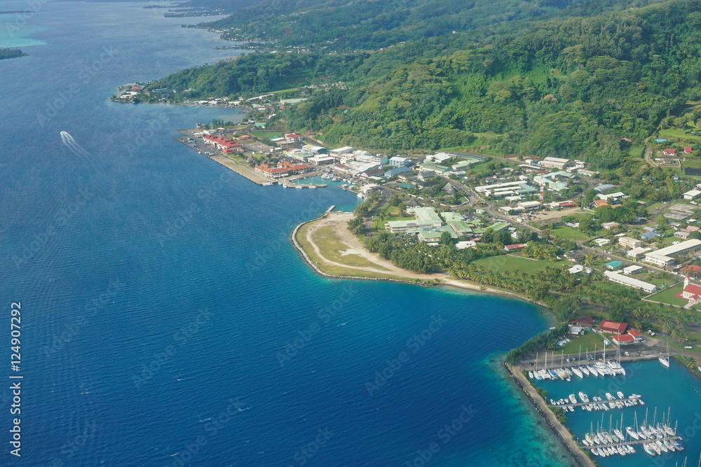 Aerial view of coastal town of Uturoa in Raiatea island, south Pacific ocean, Society islands, French Polynesia
