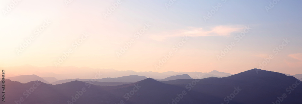 Sunset. Ridge mountains landscape. Sunrise, nature background. N