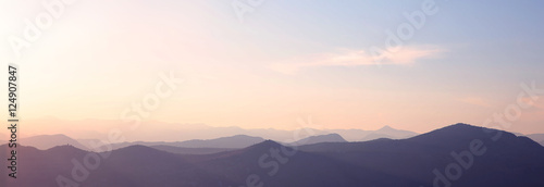 Sunset. Ridge mountains landscape. Sunrise, nature background. N