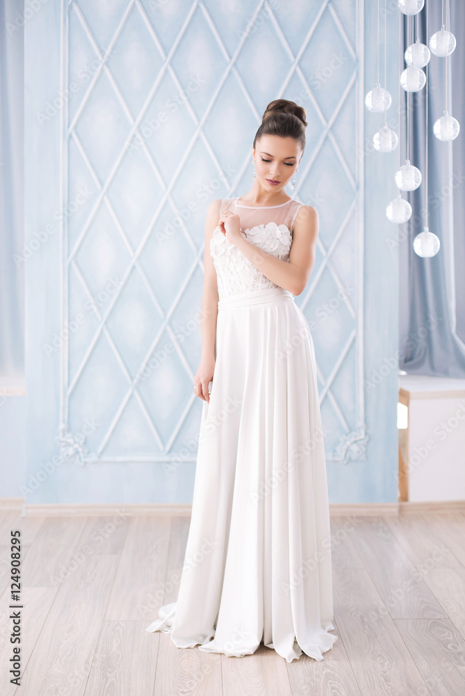 Young beautiful lady in grey evening dress Young beautiful lady in grey evening dress