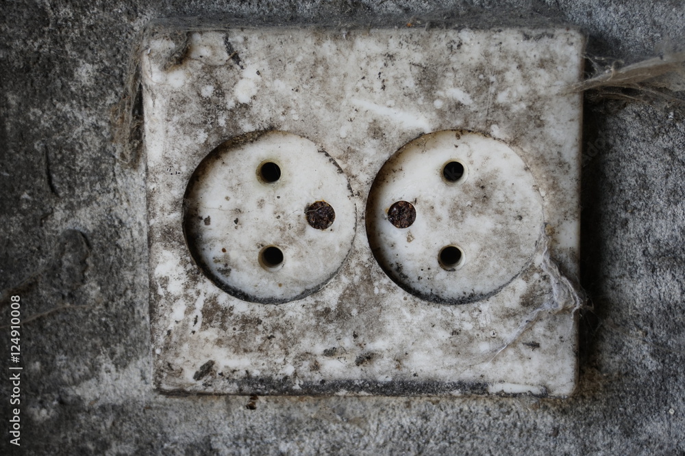 Closeup of old dirty double electrical outlet Closeup of old dirty double electrical outlet