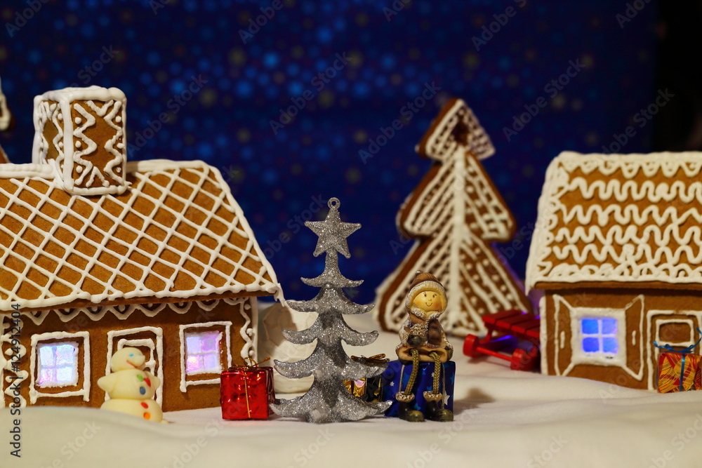 Christmas card with gingerbread house and tree