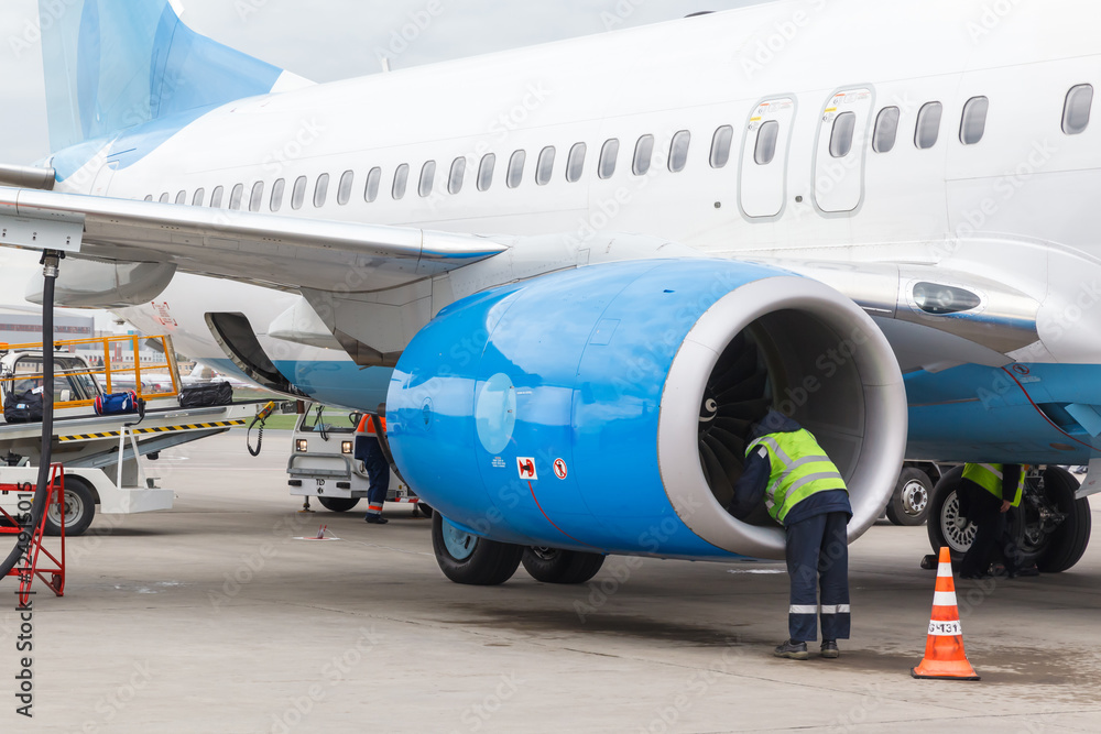 Service engineer working for the preparation of the aircraft