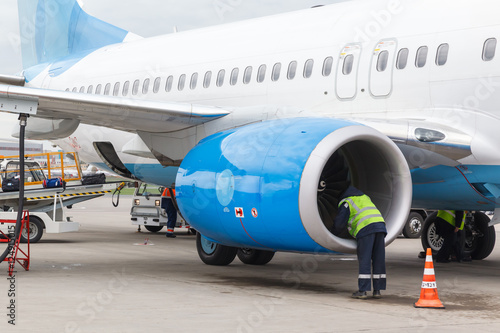 Service engineer working for the preparation of the aircraft