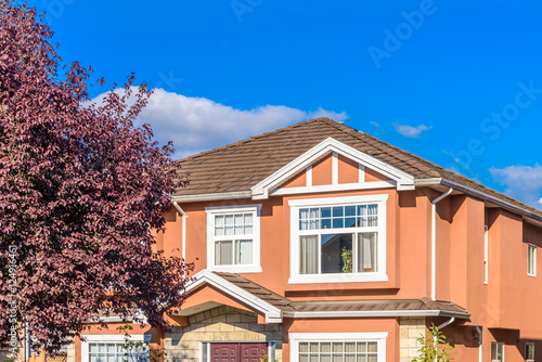 The top of the house or apartment building with nice window.