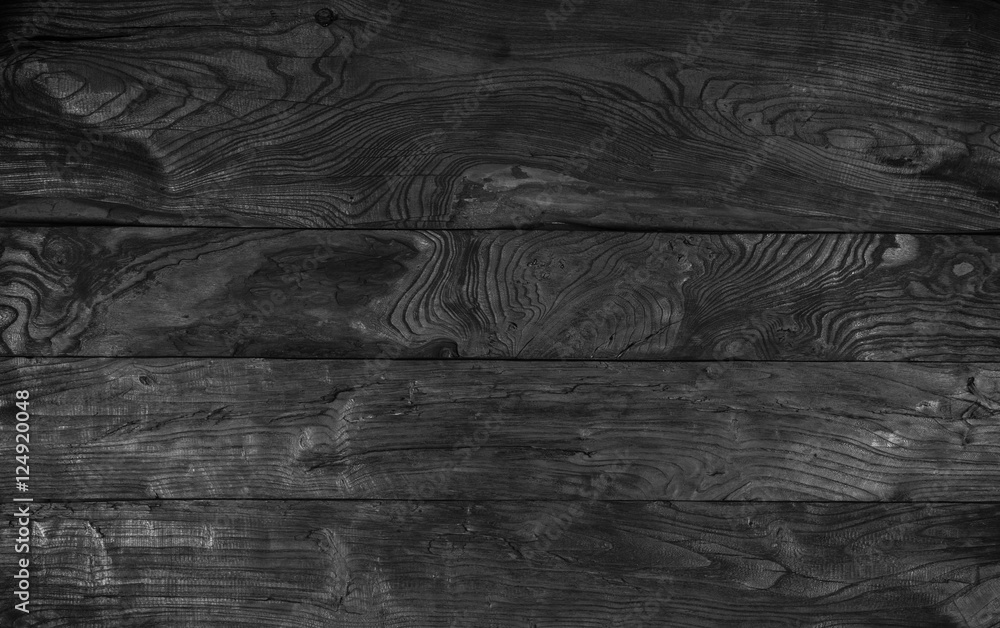 Obraz premium Czarne tło drewna, zwęglone deski, malowane czarne deski plam