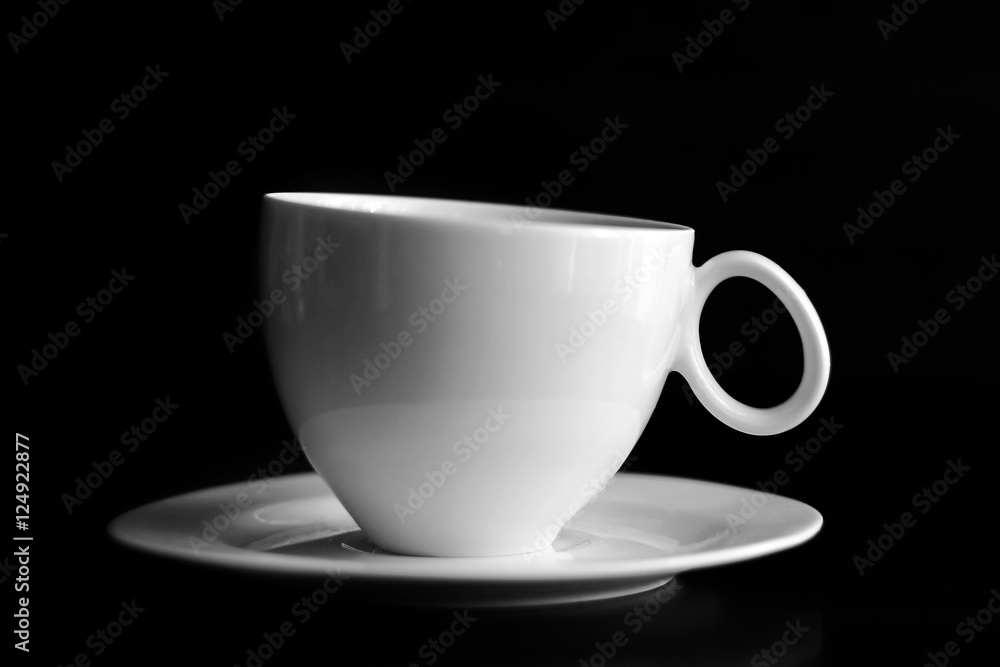 Cup of coffee on black background Cup of coffee on black background