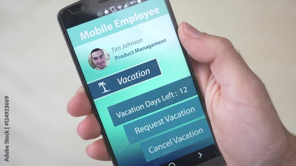 Employee checking the app from work to see a time table. Employee checking the app from work to see a time table.