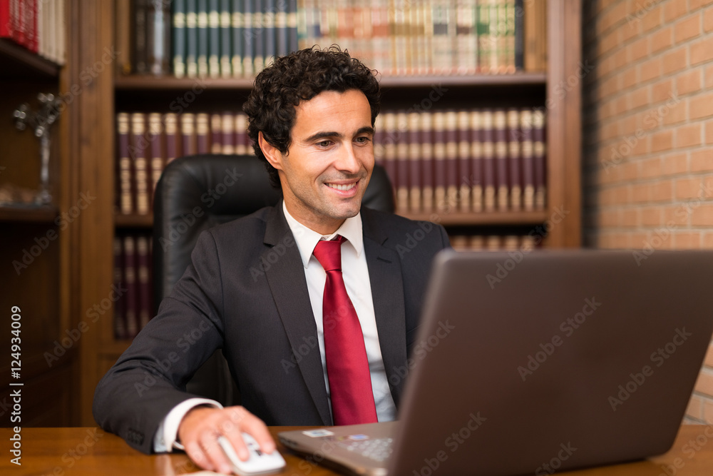 Businessman using his laptop