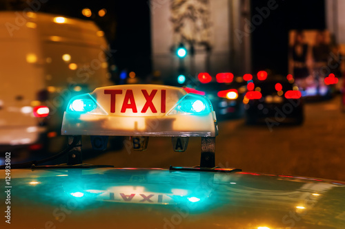 neon sign of a Parisian taxi