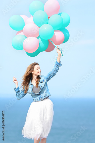 Beautiful young woman with ...