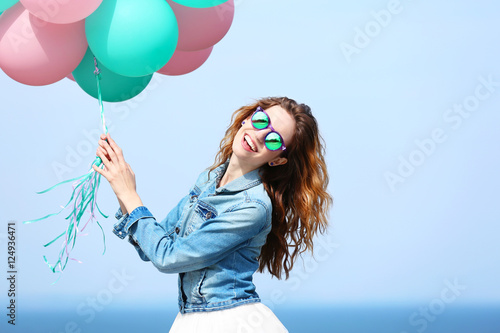 Beautiful young woman with ...