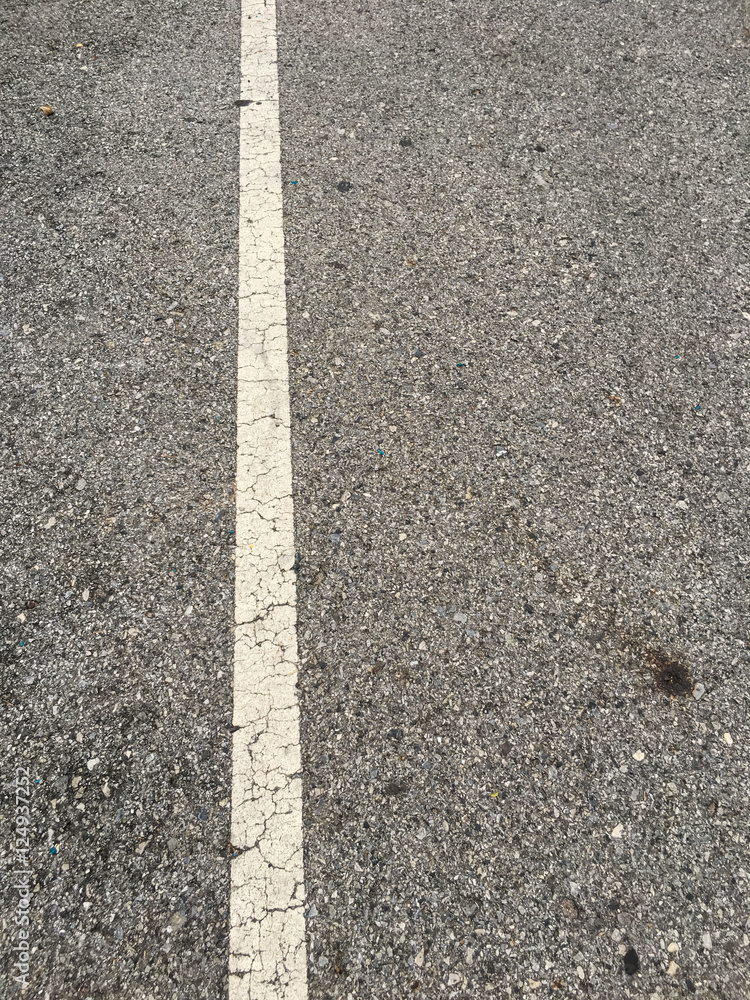 white line on black asphalt road texture background white line on black asphalt road texture background