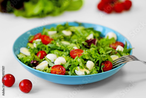 Fresh delicious salad on white background, closeup