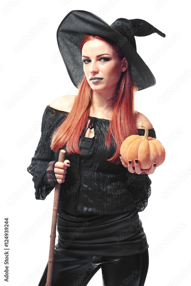 Young woman dressed in witch costume for Halloween, isolated on white Young woman dressed in witch costume for Halloween, isolated on white