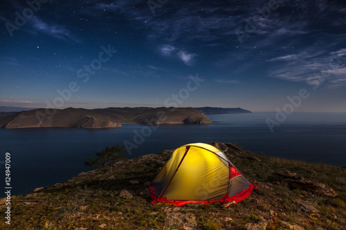 Tent against mountain at night