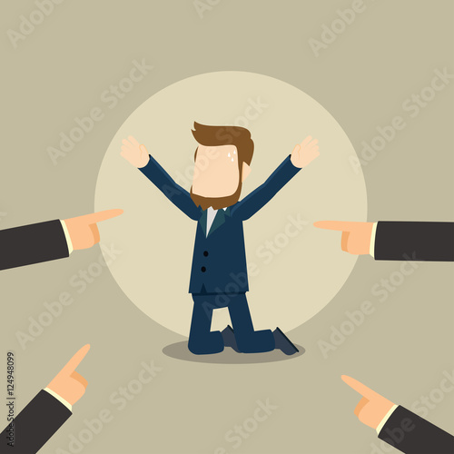 businessman with hands pointing at him