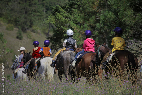 kids riding horses © danheller
