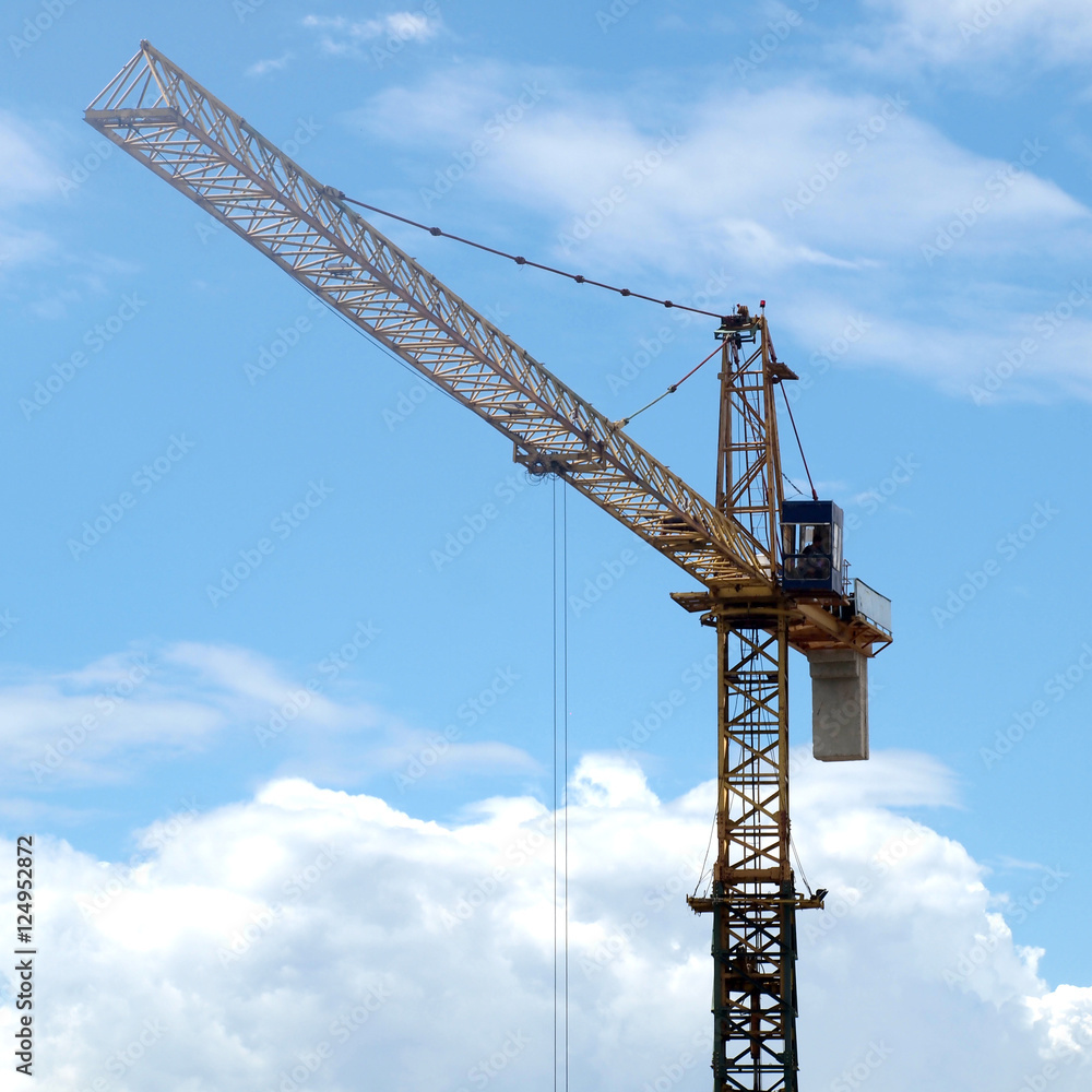 Industrial landscape with cranes on the blue sky Industrial landscape with cranes on the blue sky