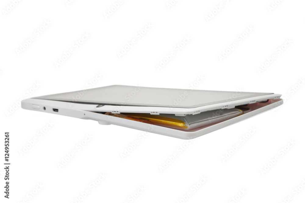 split tablet from swollen battery isolated on white background
split tablet from swollen battery isolated on white background