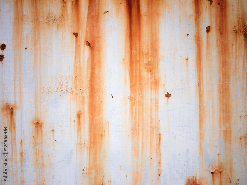 Rusty on white iron gates/plate that had been left to decay of a house in the city. abstract background texture