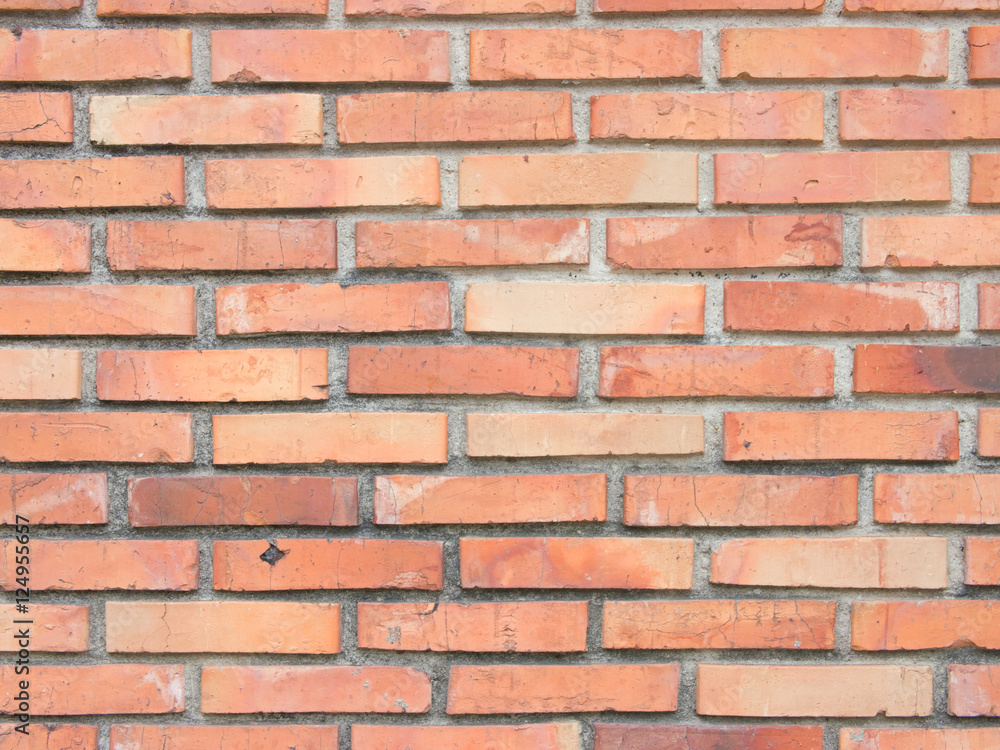 Obraz premium The old and dirty orange brick walls are dilapidated and neglected for a long time. background texture