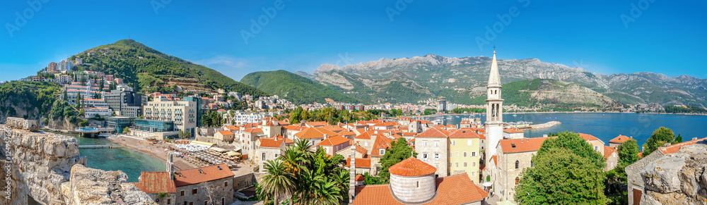Panoramic view of Budva, Montenegro from citadel in old town. Copy space in clear sky.