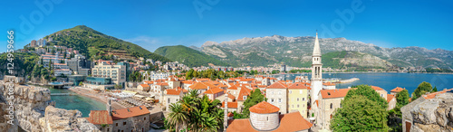 Panoramic view of Budva, Montenegro from citadel in old town. Copy space in clear sky. photo