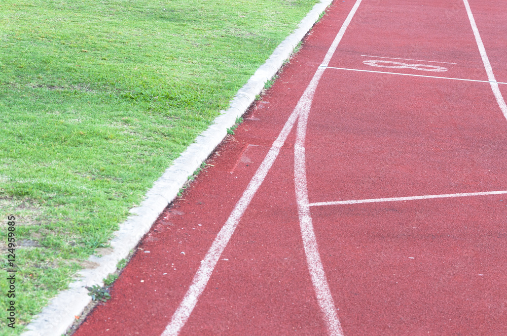 running track and green grass,Direct athletics Running track at Sport Stadium running track and green grass,Direct athletics Running track at Sport Stadium