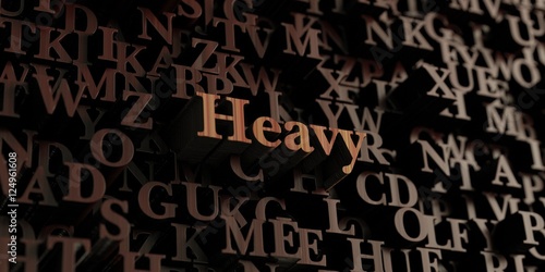 Heavy - Wooden 3D rendered letters/message. Can be used for an online banner ad or a print postcard.