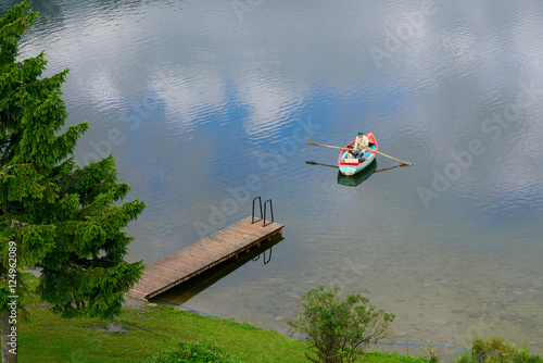 Canvas Print rowboat on a lake