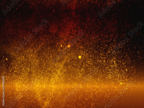 Abstract golden glittering bokeh in dark background